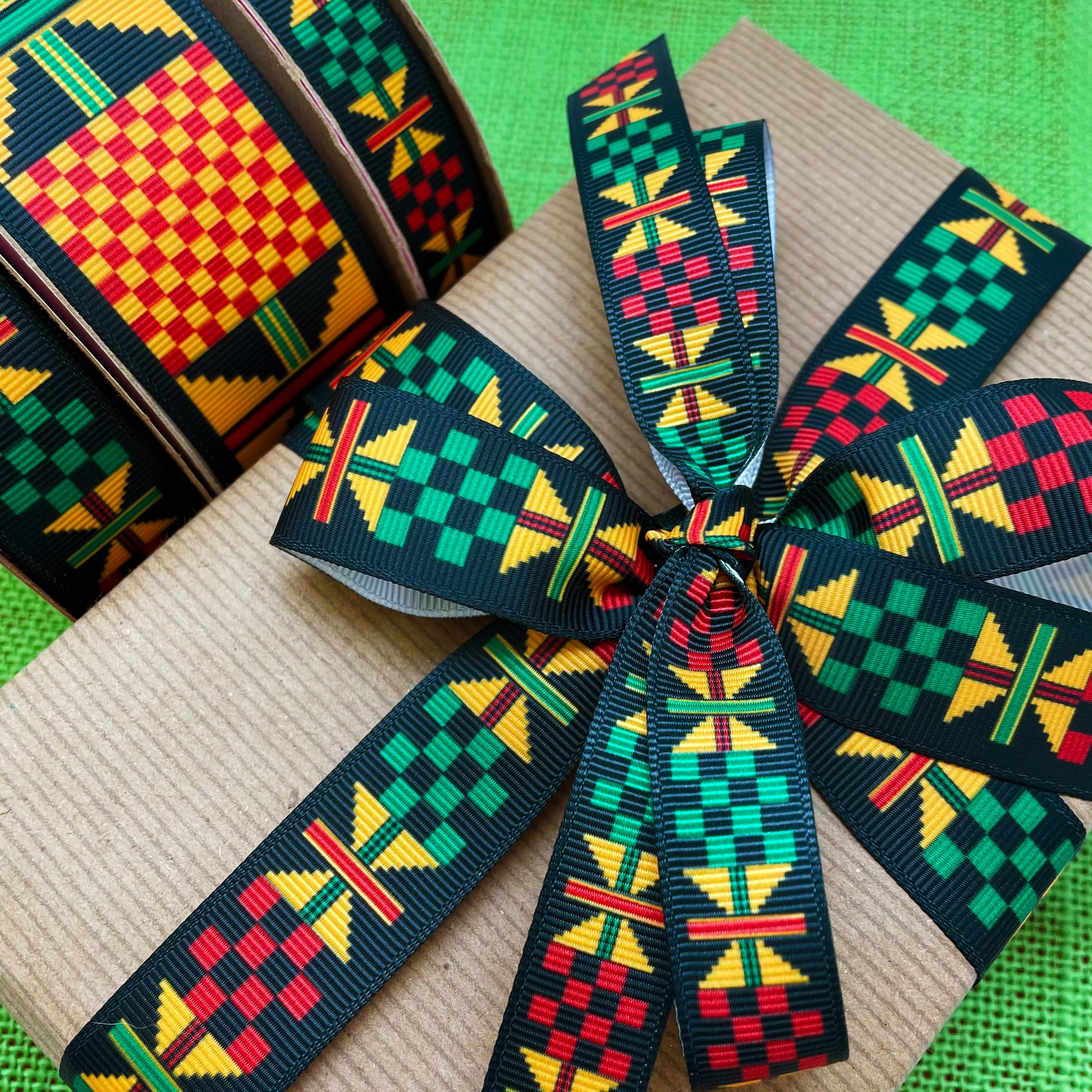 Ankara Kente ribbon African design yellow, green, black printed on7/8" white grosgrain ribbon