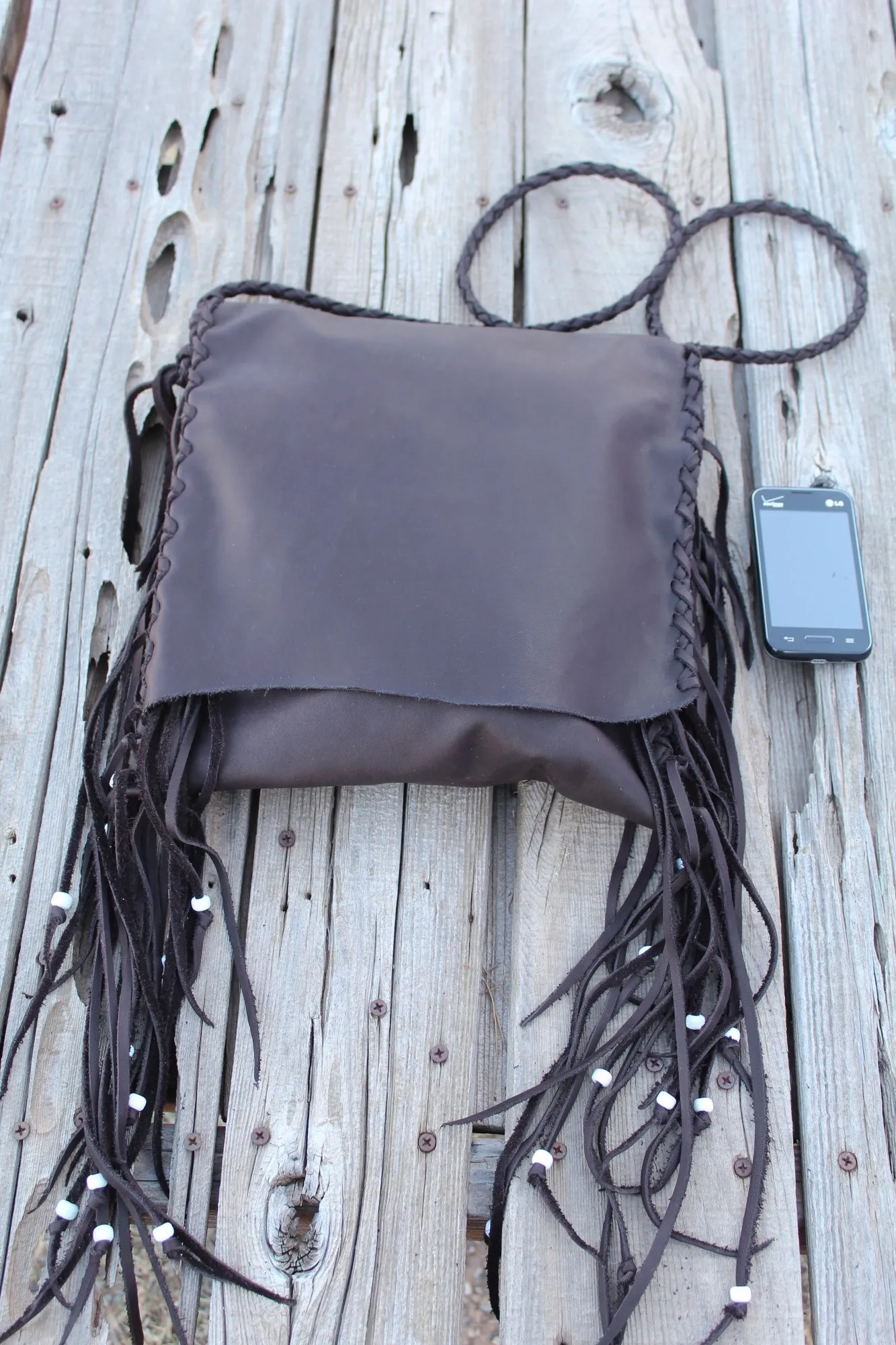 Brown leather handbag, fringed boho hippie style crossbody bag