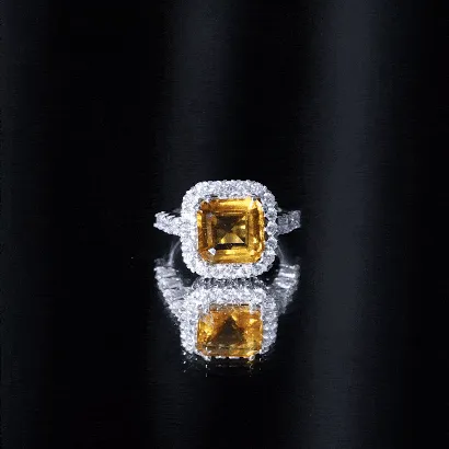 Created Yellow Sapphire and Moissanite Halo Engagement Ring