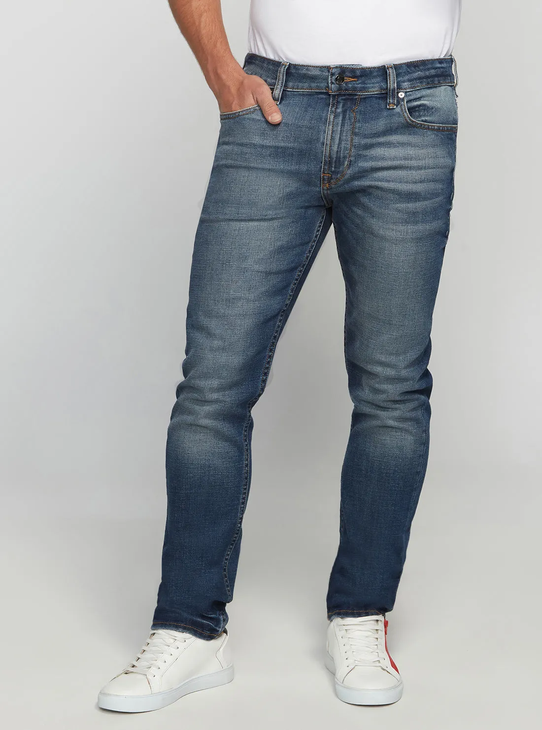 Eco Low-Rise Slim Tapered Denim Jeans In Stratus Blue Wash