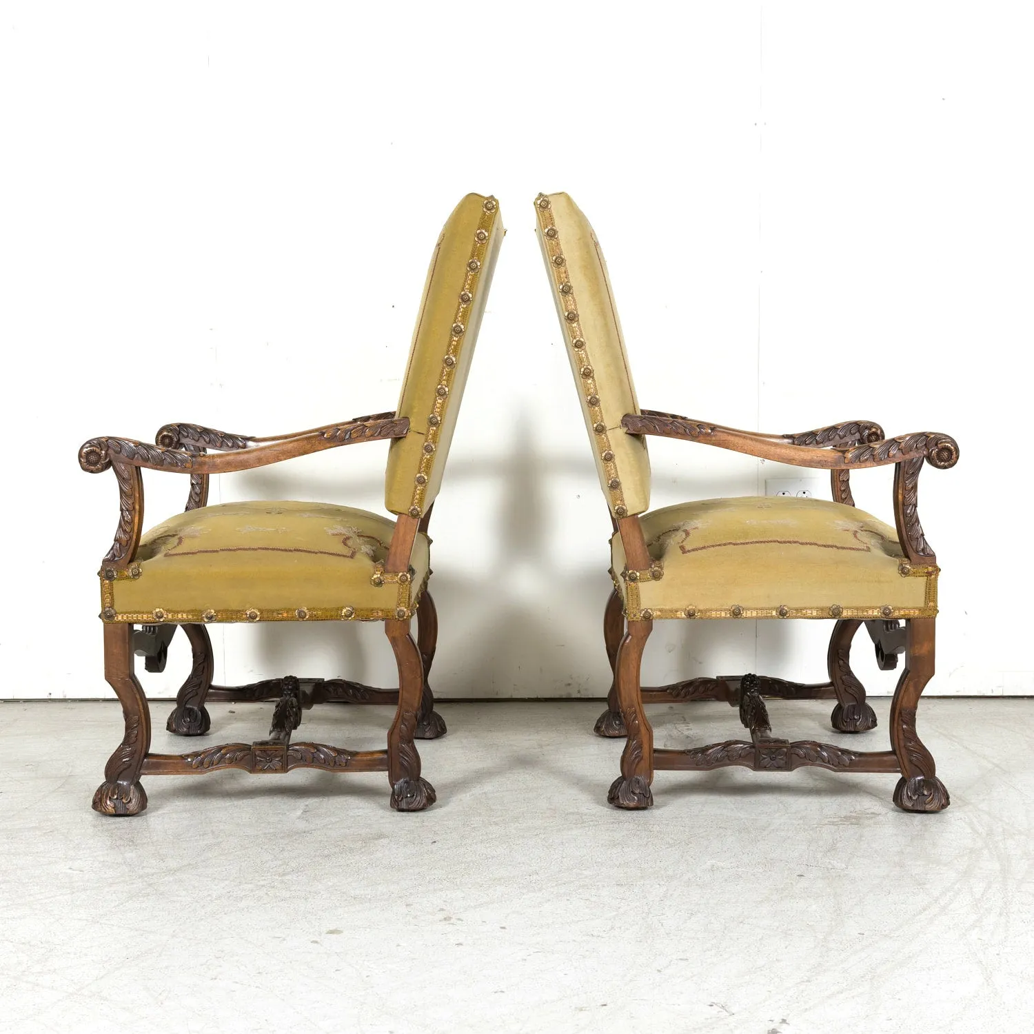 Pair of Early 19th Century French Louis XIV Style Carved Walnut Fauteuils or Armchairs