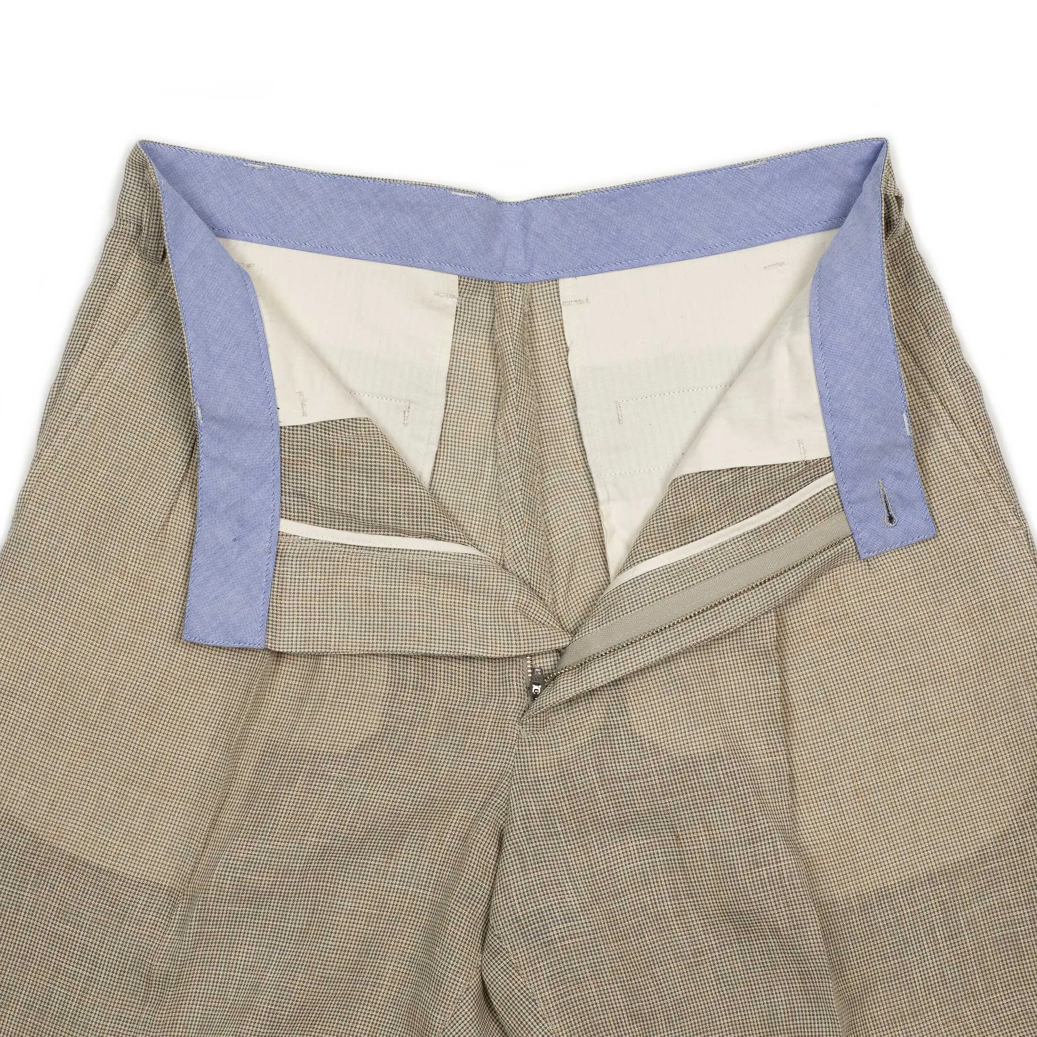 Pleated tapered trousers in ivory houndstooth linen and cupro