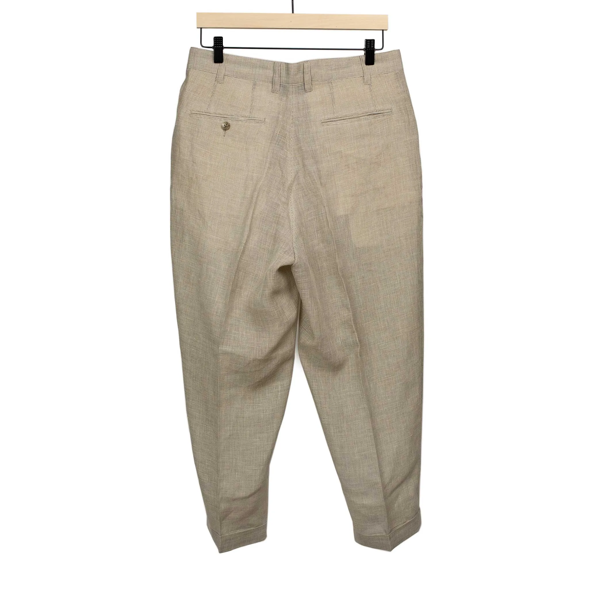 Pleated tapered trousers in ivory houndstooth linen and cupro