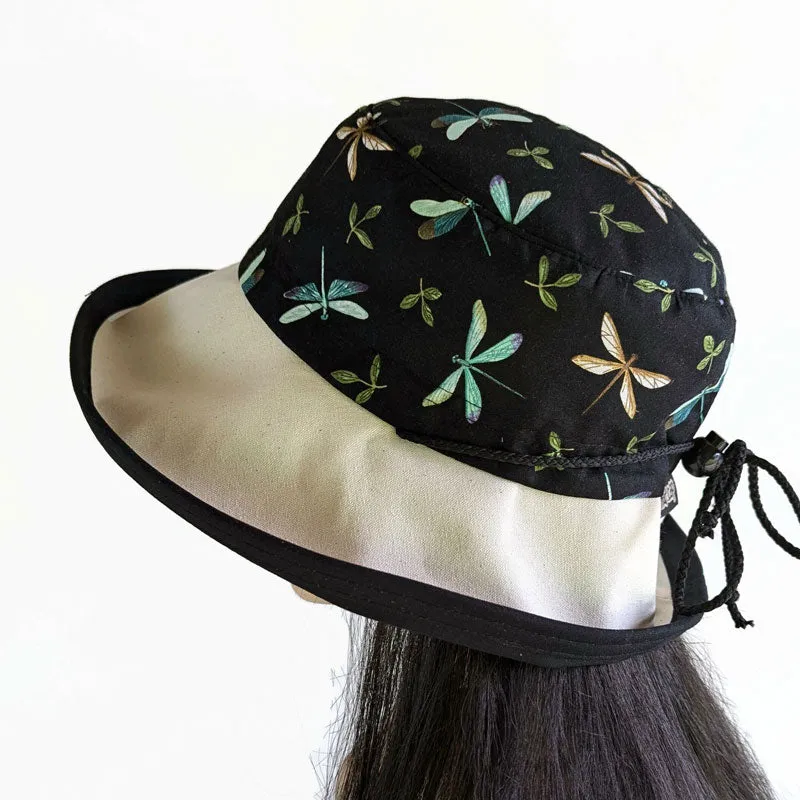 Sunblocker with lovely dragonfly print with black base, adjustable fit, wide brim