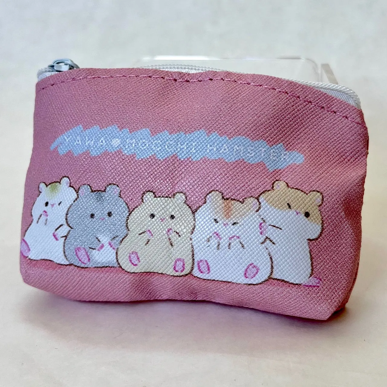 X 70997 Hamster Mini Pouch Capsule-DISCONTINUED